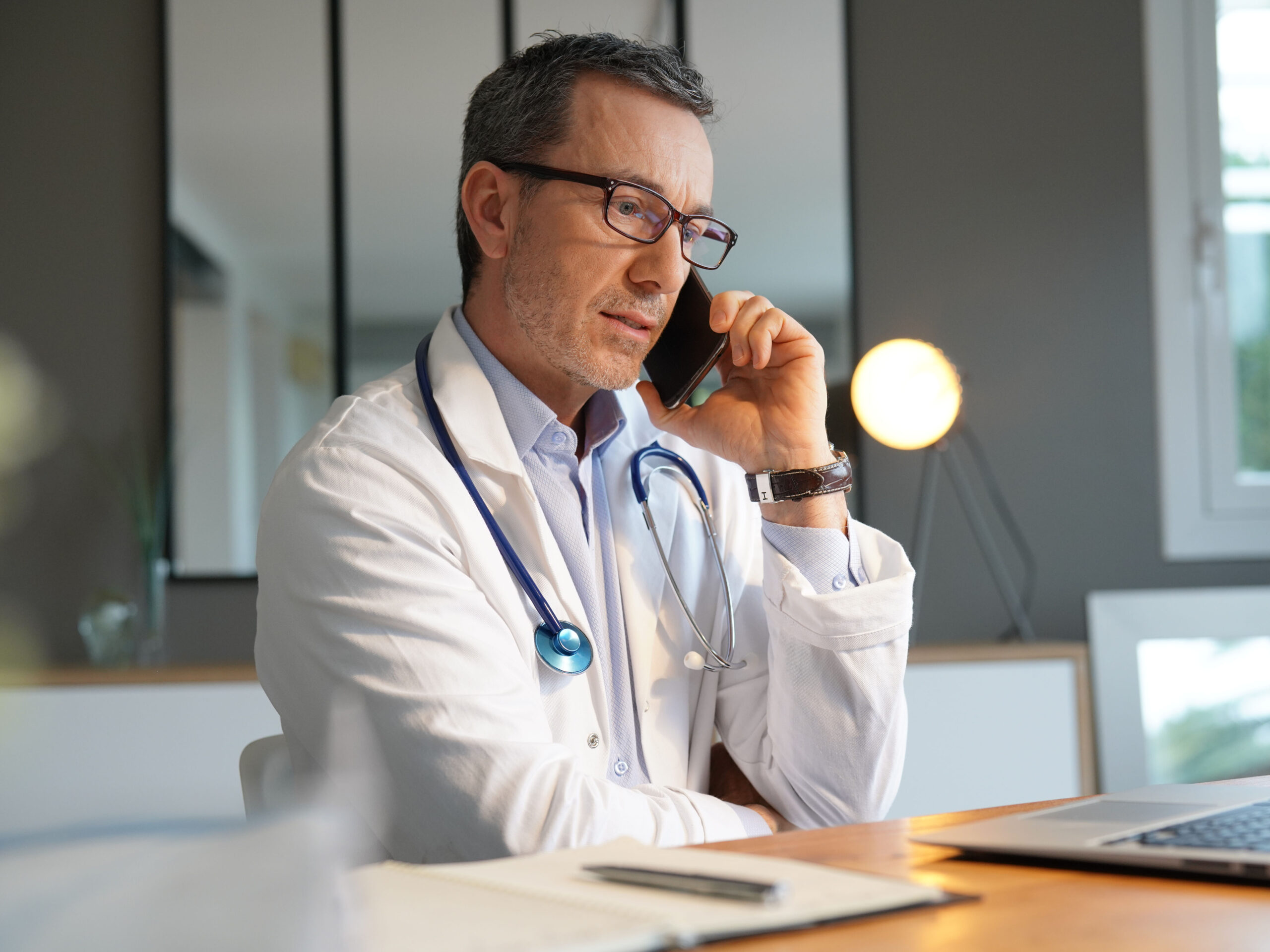 Doctor sharing Evoke Therapy Reimbursement information